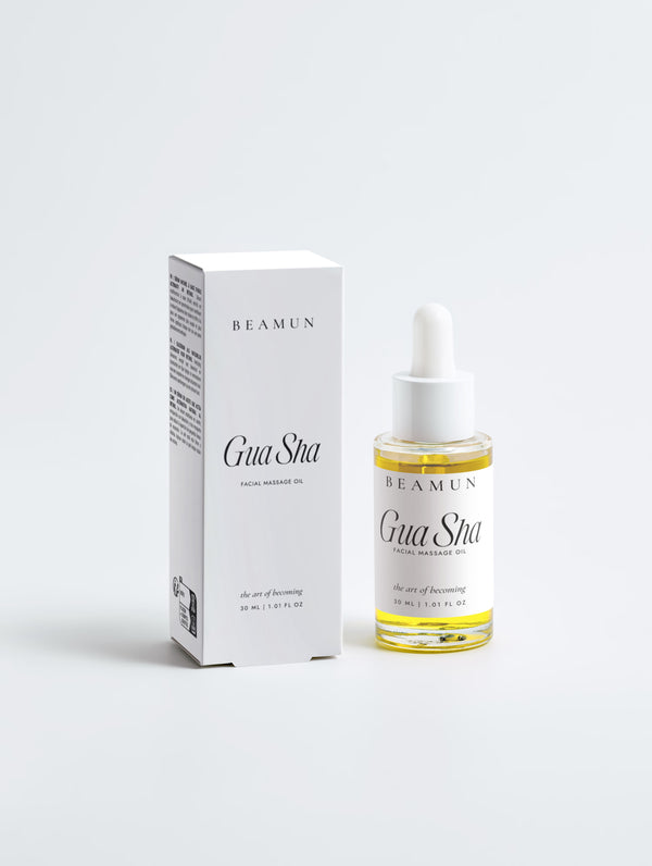Gua Sha facial massage oil and its carton, front view