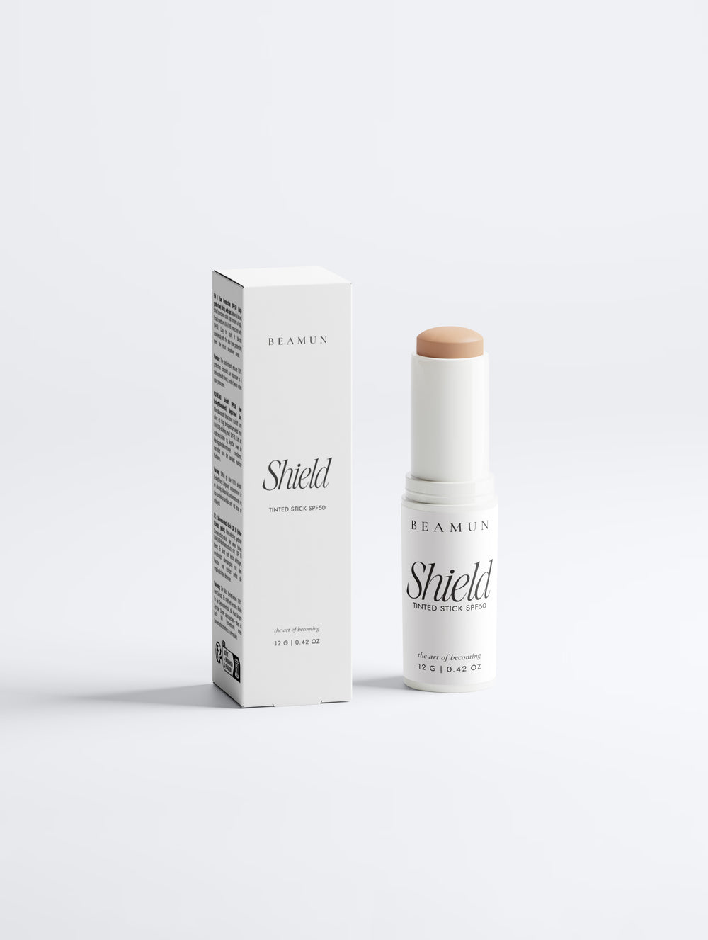 Shield tinted SPF50 stick and its carton, front view