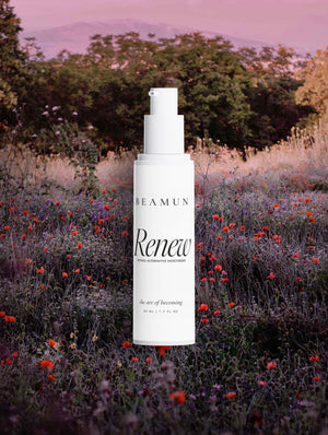 Renew bottle in a wildflower meadow at dusk
