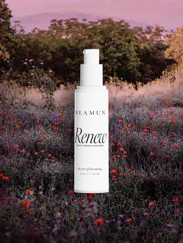 Renew bottle in a wildflower meadow at dusk