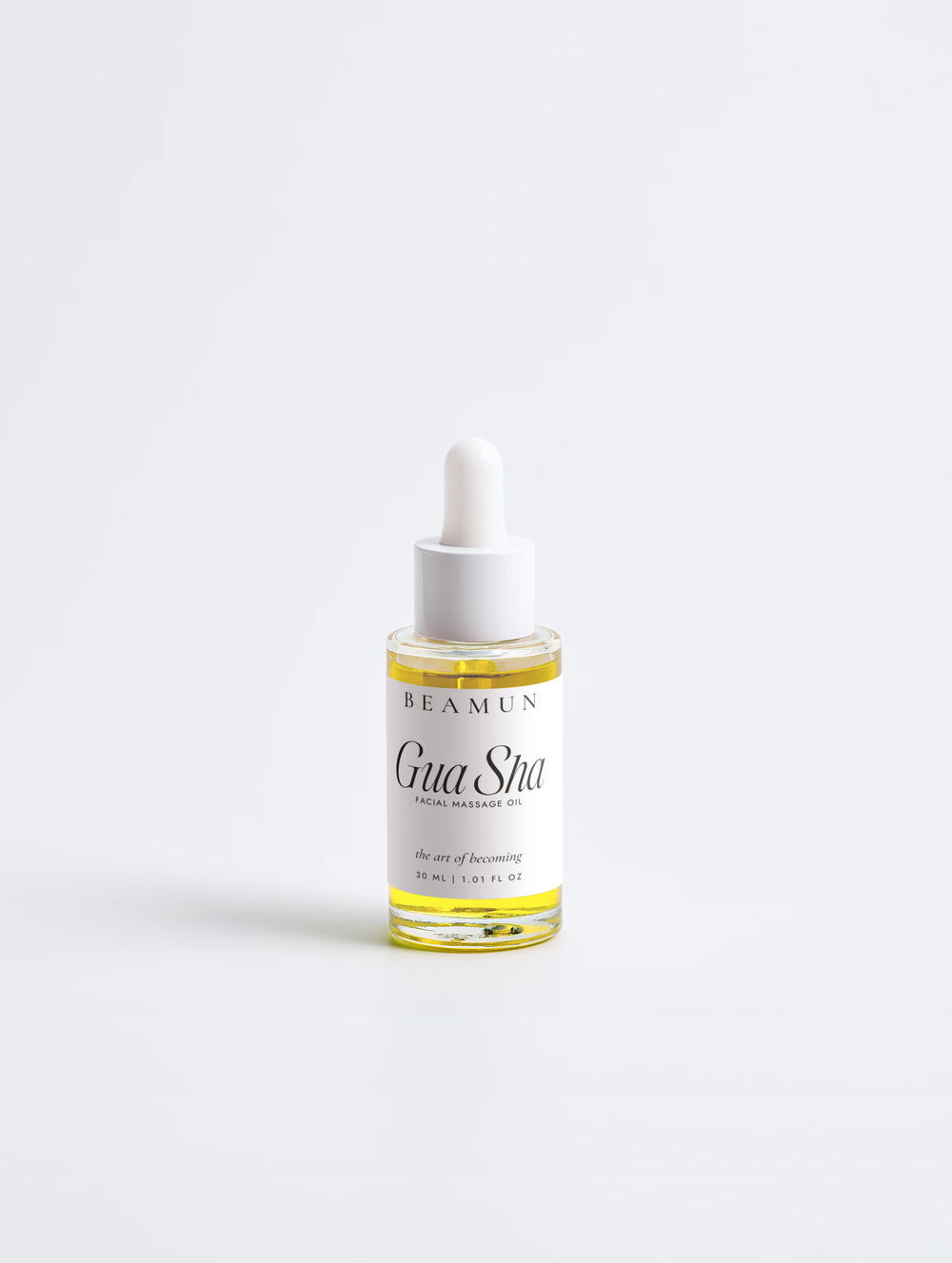 Gua Sha facial massage oil and its carton, front view