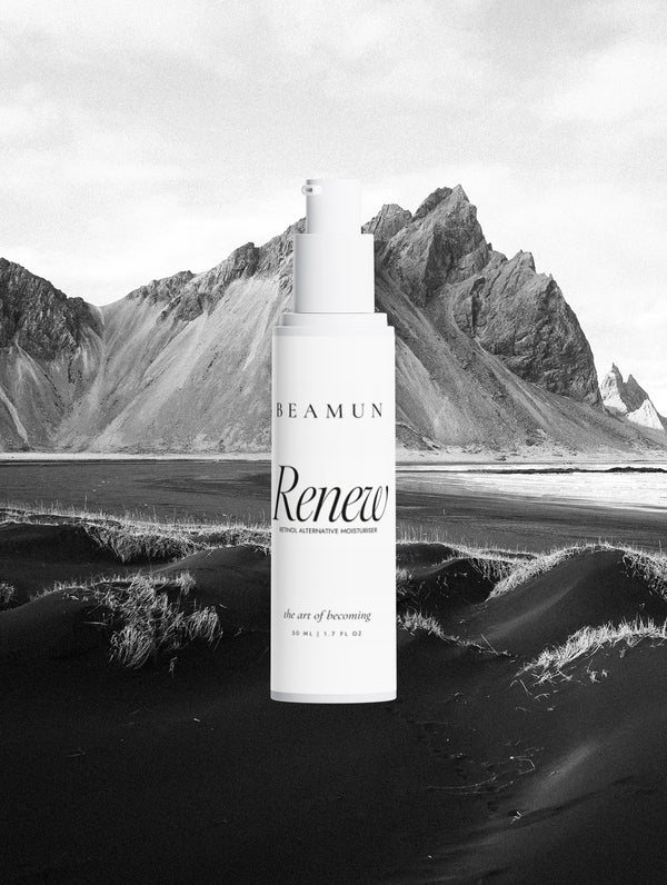 Renew bottle against a black sand beach and mountain