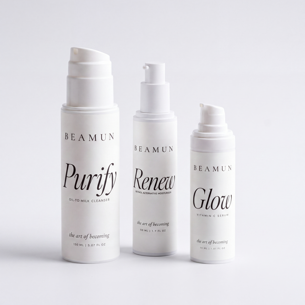 The three Becoming Ritual bottles together: cleanser, serum and moisturiser