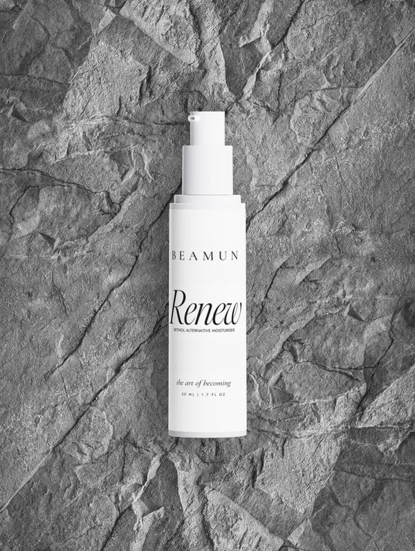 Renew bottle resting on grey stone